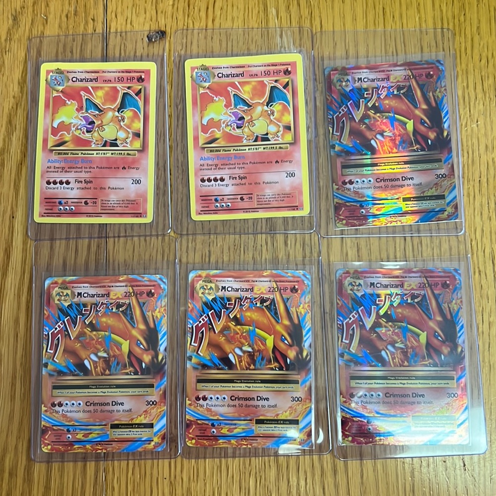 Charizard Lot of Pokémon Cards ungraded.